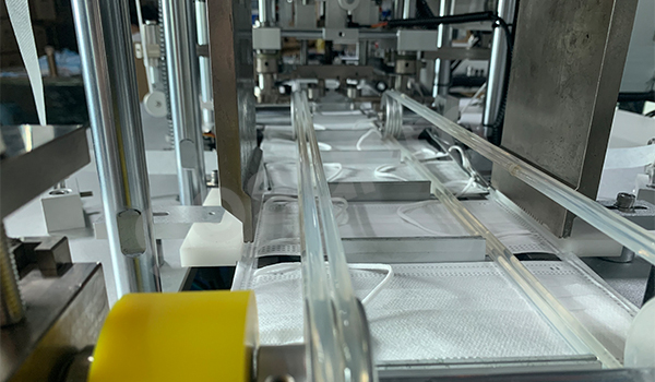 一拖一內(nèi)耳包邊口罩機